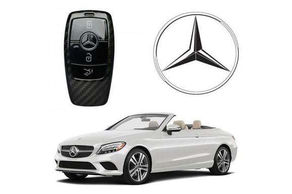 Mercedes convertible car, key fob, and logo